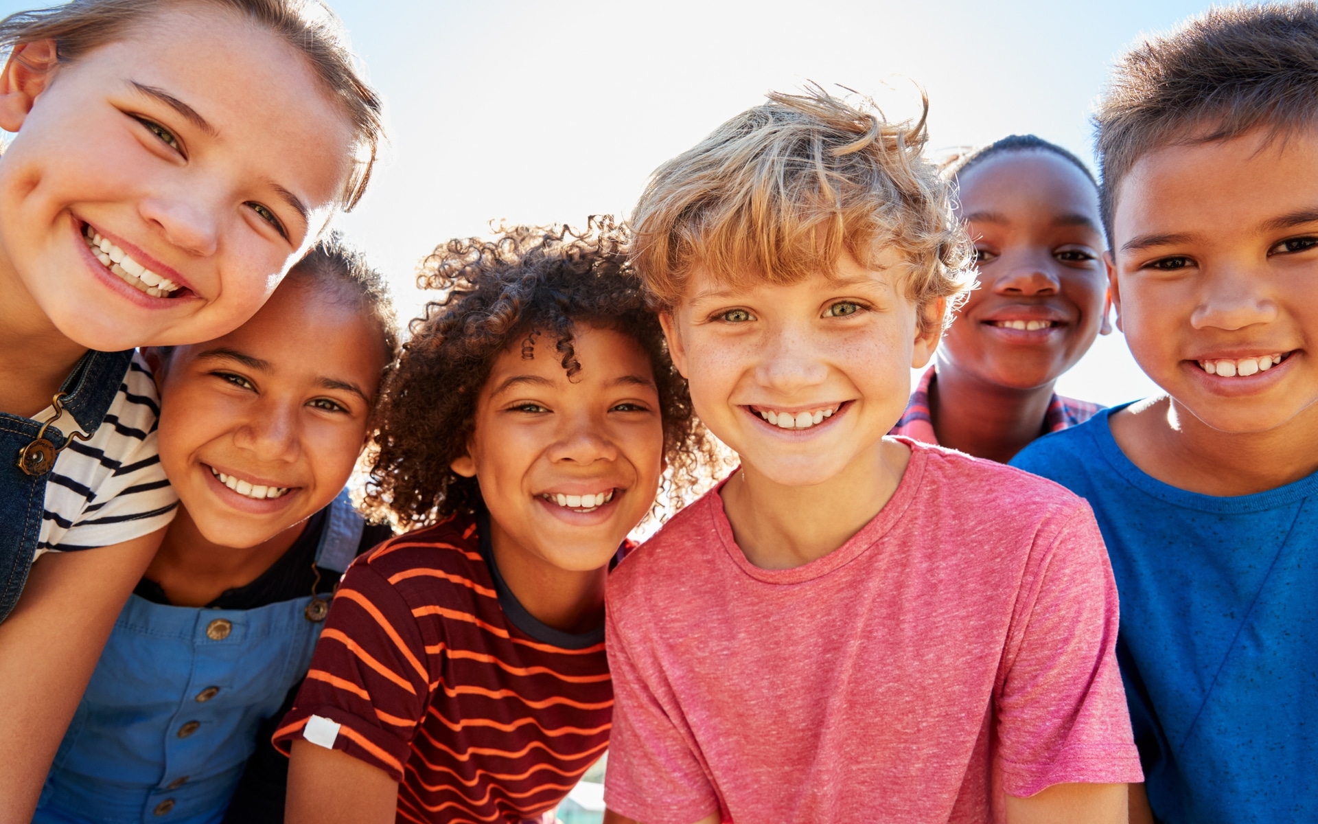 Be Yourself Be International Be Dutch. Kids looking into camera